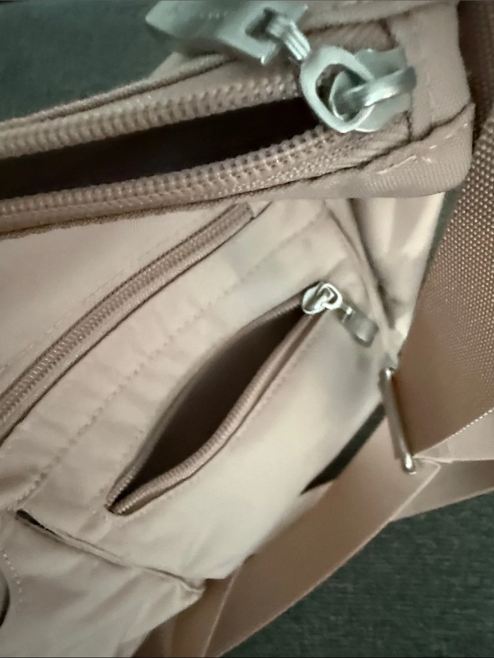 Soft Blush Hobo Bag with Front Zip Pockets